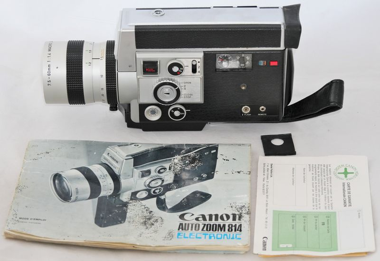 Canon Auto Zoom 814 Automatic avec sonfiltre, sa notice et sa carte de garantie