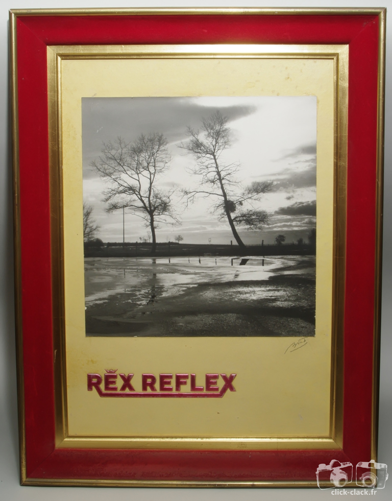 Photorex - Tableau publicitaire Rex Reflex comprenant une photo de Bernard Vial