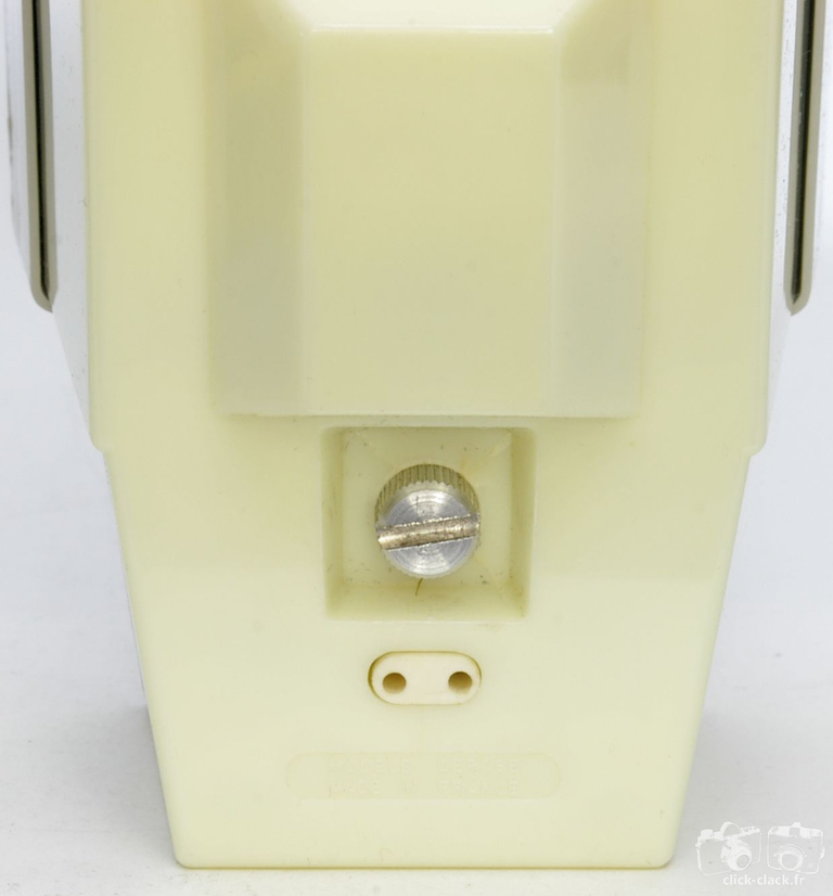Fex-Indo - Visionneuses à piles blanche vue de dos. La prise permet d'alimenter l'ampoule sur le secteur via un transformateur.